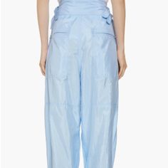 Isabel Marant Olga Sporty Nylon & Silk Pants Size 6 Us / 38 Fr Color: Light Blue Bnwot - Never Worn Parachute Pants Drop Back In To Today's Couture Via This High-Waisted Pair Cut In A Nylon And Silk Blend With Billowed Legs And Zipped Elasticized Cuffs. 28" Waist Hips: Approx 48" 28" Inseam Approx 17" Front Rise Approx 18" Back Rise Zip Fly With Two-Snap Closure Adjustable Side Tabs Front Slant Pockets; Back Zip-Patch Pockets Elastic Cuffs With Zip Closures 65% Polyamide, 35% Silk Dry Clean Spring Wide Leg Nylon Parachute Pants, Spring Nylon Wide-leg Parachute Pants, Spring Nylon Wide Leg Parachute Pants, Nylon Wide Leg Parachute Pants For Spring, Fitted Ankle-length Parachute Pants For Spring, Spring Nylon Cargo Pants, Spring Nylon Pants With Cargo Pockets, Nylon Straight Pants For Spring, Nylon Pants With Elastic Waistband