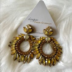 Beautiful Handmade Designer Deepa Gurnani Large Statement Earrings. New With Tags. These Are Definitely Runway Worthy! They Have Crystals And Stainless Steel Beads With A Felt Backing, Which Makes Them Surprisingly Light Weight. These Measure 2.5" X 1.75" At Their Longest Points. Perfect For Any Occasion That You Need To Give Your Outfit A High Fashion Lift! Yellow Chandelier Earrings, Yellow Dangle Crystal Earrings For Party, Yellow Earrings For Party, Yellow Dangle Crystal Party Earrings, Jeweled Chandelier Drop Earrings, Elegant Yellow Chandelier Earrings As Gift, Bohemian Yellow Dangle Chandelier Earrings, Yellow Jeweled Jewelry For Party, Yellow Bohemian Earrings For Festive Occasions