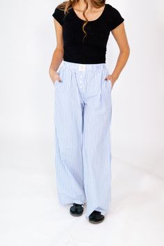 Get cozy in style with the Slumber Party Pajama Pants. Featuring a classic blue stripe pattern and a relaxed boxer-inspired fit, these pants are perfect for lounging, movie nights, or catching up on sleep. Made with soft, breathable fabric, they’ll keep you comfortable all night (or day) long. Key Features: Classic blue stripe design for timeless charm Relaxed boxer-style fit for ultimate comfort Soft, breathable fabric for cozy wear Ideal for lounging, sleepovers, or casual home days Elevate yo