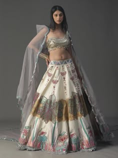 Hand Embellished Silk Lehenga For Festivals, Designer Hand Embellished Silk Lehenga, Bollywood Style Hand Embellished Silk Lehenga, Hand Embellished Silk Choli For Wedding, Elegant Tissue Silk Lehenga With Sequins, Elegant Tissue Silk Traditional Wear With Sequins, Elegant Traditional Wear With Sequins In Tissue Silk, Elegant Sequined Tissue Silk Lehenga, Elegant Sequined Tissue Silk Sharara