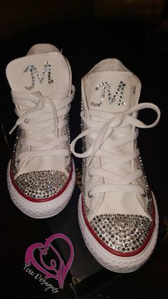 "There's nothing like having your own \"Custom Bling'd out Converse!\" These converse are fully strassed in high quality crystals. Each stone is hand placed on each shoe given you that custom bling to perfection. They can be customized in any color and can be done in infant, toddler and big kids sizes.  For Kids Sizes Please Click Here: https://www.etsy.com/listing/558550345/girls-rhinestone-converse-shoes-bling?ref=shop_home_active_5 Shoes can also be designed differently then the shoe shown above. Please send message if you would like a different design. The designing process can take up to two weeks and shoes are normally shipped 2-3 weeks after receiving the shoe.  If the item is needed before the shop turn around time and you would like to purchase, please message me BEFORE purchasing Bling Converse Shoes, Converse Shoes Custom, Rhinestone Converse, Converse Wedding, Bling Converse, Wedding Converse, Girls Shoes Sneakers, Custom Bling, Custom Converse