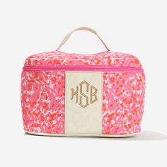 New to our travel collection, this Monogrammed Train Case is the perfect addition for your travels! Made with high quality materials, this case is plenty durable to safely carry all your cosmetics and goes perfectly with your other personalized travel accessories! Fully lined, this bag features a zipper closure and attached mirror on the inside of the bag. It can also easily be paired with our fab matching counterparts, the spotted collection!Exterior is made of Polyester and Cotton with faux le Trendy Rectangular Travel Cosmetic Storage, Trendy Rectangular Travel Cosmetic And Toiletry Storage, Trendy Rectangular Cosmetic And Toiletry Storage For Travel, Rectangular Cosmetic Bag With Luggage Sleeve For Personal Use, Personalized Rectangular Travel Cosmetic Bag, Marley Lilly, Circle Monogram, Train Case, Silver Lights