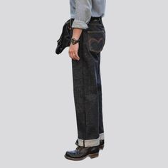 Introducing the 2023 Autumn Collection's Straight Medium-Rise Self-Edge Jeans for men, an ultra-couture selvedge vibe upgrade to your timeless denim look! Crafted with tall quality 15oz denim, this piece offers a leisurely mid-rise fit, self-edge hemline, and a buttoned closure that promises to elevate any look with the perfect amount of attitude.Why You'll Love it: Raw & Refined: The perfect combination of raw and refined, this piece is textured to be both timeless and trendsetting. Mid-Waist C Straight Leg Jeans With Welt Pockets For Streetwear, Dark Wash Flare Jeans With Belt Loops, Selvedge High Rise Jeans For Streetwear, Selvedge Denim Blue Jeans For Streetwear, Selvedge Dark Wash Pants For Streetwear, High Rise Selvedge Jeans With Relaxed Fit, Classic Wide Leg Selvedge Pants, Classic Selvedge Wide Leg Pants, Dark Wash Selvedge Tapered Leg Jeans