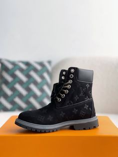 Embrace urban sophistication with these Timberland-inspired boots, reimagined in a sleek black colorway with the iconic Louis Vuitton monogram. Crafted with premium materials and meticulous attention to detail, these boots offer a unique blend of rugged functionality and high-fashion flair. Conquer the city streets in style and comfort. Disclaimer: This product is inspired by the Louis Vuitton x Timberland design but is not an official Louis Vuitton or Timberland product. Louis Vuitton Timberland Boots, Timberland 6 Inch, Custom Painted Shoes, Fall Winter Jacket, Timberland 6, Urban Sophistication, Black Timberlands, Loafer Sneakers, Bottega Veneta Shoulder Bag