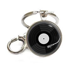 a black and white record keychain with a vinyl disc on it's side