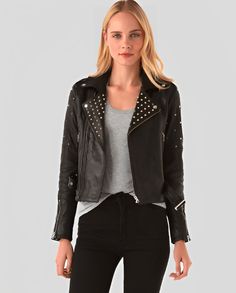 Women's Studded Biker Leather Jacket In Black Biker Style Studded Outerwear For Fall, Edgy Studded Biker Jacket For Winter, Rock Style Studded Leather Jacket For Winter, Winter Rock Style Leather Jacket With Studs, Winter Leather Studded Biker Jacket, Fall Leather Biker Jacket With Studs, Studded Leather Biker Jacket For Winter, Winter Leather Biker Jacket With Studs, Edgy Studded Long Sleeve Biker Jacket