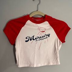 Crop Top Baseball Tee Red And White With Navy Blue Writing Never Used Red Retro Top With Graphic Print, Retro Red Top With Letter Print, Red Casual Tops With Letter Print, Casual Red Tops With Letter Print, Red Graphic Tee With Letter Print, Summer Red Graphic Tee, Red Summer Graphic Tee, Red Fitted Retro T-shirt, Sporty Red Shirt For Summer