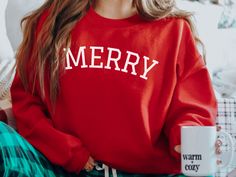 The comfiest Merry sweatshirt, perfect for Christmas! This Christmas crewneck is so cute and makes the perfect gift for any Christmas Lovers, or wear it yourself to show your holiday pride!  ABOUT ✨ This design is printed on a Gildan 18000 Unisex Heavy Blend™ Crewneck Sweatshirt ✨ Sweatshirt sizes are Unisex, please refer to sizing chart in listing photos ✨ Materials are 50% cotton, 50% polyester ✨ Medium fabric weight ✨ Sweatshirt has a loose fit which is perfect for a more oversized look, or size down for a more fitted feel. CARE INSTRUCTIONS ✨Machine wash: warm (max 40C or 105F); Tumble dry: medium heat ✨Tumble dry: medium heat ✨Do not iron directly on the print PRODUCTION TIME AND SHIPPING ✨The average production time for this Merry sweatshirt is 2-5 days. This does not include shippin Christmas Sublimation Designs, Merry Christmas Vintage, Merry Christmas Svg, Christmas Tshirt, Merry Christmas Png, Holiday Sweatshirt, Christmas Sublimation, Teacher Christmas, Sweatshirt Christmas