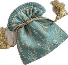 Elegant Embroidered Ceremonial Bags, Elegant Blue Gift Bag, Designer Shoulder Gift Bag, Gold Tilla Bag As Gift, Traditional Blue Bags For Festivals, Gold Tilla Bag For Gifts, Traditional Blue Shoulder Bag For Festivals, Luxury Embroidered Bag As Gift, Luxury Embroidered Bags As Gifts