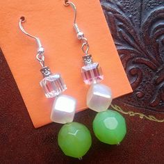 Hand Crafted Fashionable Hanging Earrings With Sterling Silver Fish Hooks And Transparent, Green, And White Pearly Finished Beads. Transparent Bead Has Tint Of Yellow, Blue/Purple And Pink They Are Never Worn Before But The Beads Have Some Discolorations. Colors: Transparent, Pearl And Green Beads Material: Sterling Silver Hooks (925) Prices Are Negotiable Bundle Items To Save More White Faceted Beads Drop Earrings, White Faceted Beads Earrings For Party, Homemade Earrings, Diy Earring, Fish Hooks, Silver Fish, Earring Ideas, Green Beads, Hanging Earrings