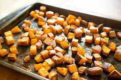 cooked sweet potatoes on a baking sheet ready to be baked in the oven or used as an appetizer