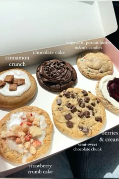 a box filled with different types of cookies