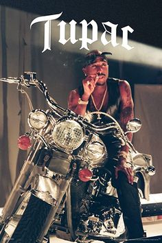 a man sitting on top of a motorcycle with the words tupac in front of him