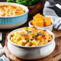 macaroni and cheese with parmesan cheese on top in a white bowl