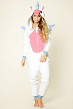 This plush hooded jumpsuit features an embroidered unicorn design on the hoodie, protruding ears, horn, stitched angel wings on the back, a zipper front, long sleeves, and contrast trim. Hooded Pajama, Pajama Jumpsuit, Embroidered Unicorn, Hooded Jumpsuit, Real Unicorn, Unicorns And Mermaids