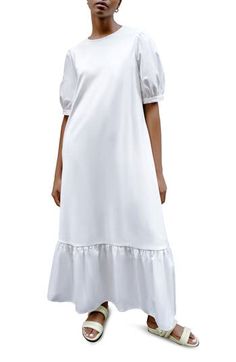 Puffed sleeves and a flouncy hem frame this relaxed-fit midi dress made from crisp cotton poplin. Hidden back-zip closure Slips on over head Crewneck Elbow-length sleeves Side-seam pockets 60% viscose, 30% polyamide, 10% Lycra® spandex with 100% cotton sleeves and hem Hand wash, line dry Imported Cotton Midi Dress With Ruffle Hem For Daywear, Puff Sleeve Cotton Maxi Dress With Ruffles, Cotton Midi Dress With Ruffle Hem, Cotton Maxi Dress With Ruffles And Puff Sleeves, Casual Midi Puff Sleeve Dress With Ruffle Hem, Cotton Maxi Dress With Puff Sleeves For Daywear, Summer Puff Sleeve Dress With Ruffle Hem For Daywear, White Cotton Midi Dress With Ruffle Hem, Cotton Midi Dress With Puff Sleeves