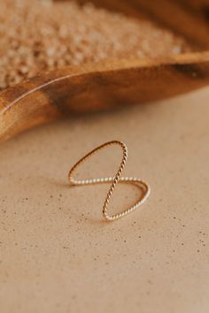 We're feeling swell and living well! While we've been hard loving our Swell Ring for quite some time, we’re excited to introduce its twisted version! Originally inspired by the swell of ocean waves, his new design features a textured twisted wire that we’re absolutely smitten with. This twisted texture is hand-shaped and slightly adjustable. Available in 14kt Gold Fill + Sterling Silver. Handmade in Eau Claire, WI. Our jewelry is handmade so each piece will be unique and may vary slightly from w Twisted Wire, Hard To Love, Hand Shapes, Living Well, 14kt Gold, Ocean Waves, Free Bag, You Bag, New Design