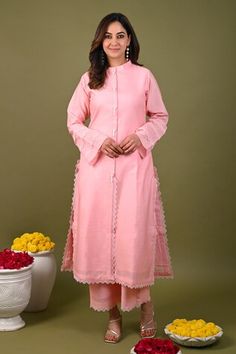 Pink kurta with placement lace detailing and beaded fringe buttons. Paired with a matching plain pant with lace detail on hem. - Aza Fashions Designer Lace Work Kurta, Festive Straight Kurta With Lace Trim, Festive Lace Work Palazzo Set, Traditional Lace Trim Set For Spring, Traditional Spring Sets With Lace Trim, Festive Cotton Sets With Lace Trim, Traditional Palazzo Set With Lace Work, Traditional Lace Work Sets For Spring, Festive Cotton Palazzo Set With Lace Work