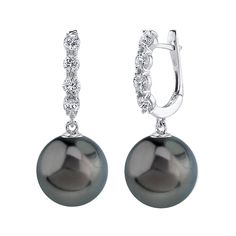 These elegant pearl earrings feature two 12mm AAA quality Tahitian South Sea pearls, handpicked for their incredible luster and overtones. The pearls are mounted on the finest 18K gold with dazzling SI clarity diamonds.
These earrings come packaged in a beautiful jewelry gift box, perfect for gifting. Formal High Luster Akoya Pearl Earrings, Formal Tahitian Pearl Earrings In White Gold, Tahitian Pearl Earrings In White Gold For Formal Occasions, Formal Akoya Pearl Earrings With High Luster, Elegant Tahitian Pearl Earrings For Formal Occasions, Luxury Tahitian Pearl Wedding Earrings, Luxury Tahitian Pearl Earrings For Anniversary, Luxury Tahitian Pearl Earrings In White Gold, Elegant White Gold Tahitian Pearl Earrings