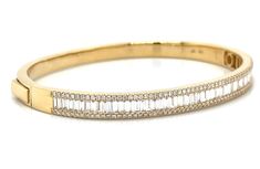 Experience the elegance and luxury of this stunning 2.11ct tw baguette and round-cut diamond gold bangle bracelet. The perfect accessory for any outfit, this timeless piece features a dazzling display of diamonds for a chic and sophisticated look. Elevate your style with this must-have bracelet and make a statement wherever you go! Metal: 18K Yellow GoldDiamond Shape , Weight: (126) Round Cuts 0.57ct tw, (52) Baguette Cuts 1.54ctwDiamond Total Weight: 2.11ct twBangle/Wrist Width: 5.4cm x 4.4cmBa Necklace Guide, Diamond Initial Necklace, Jewelry Appraisal, Bridal Engagement Rings, Sophisticated Look, Jewelry Rings Diamond, Gold Bangle Bracelet, Gold Bangle, Diamond Gold