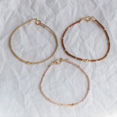 Handmade Rose Gold Beaded Bracelets For Everyday, Dainty Gold Beaded Bracelets For Everyday, Dainty Beaded Bracelets With Gold Beads For Everyday, Delicate Stackable Beaded Bracelets With Round Beads, Dainty Rose Gold Beaded Bracelet With Tiny Beads, Delicate Everyday Beaded Bracelets, Delicate Adjustable Gold Beaded Bracelets, Dainty Everyday Beaded Bracelets With Tiny Beads, Dainty Beaded Bracelets With Tiny Beads For Everyday