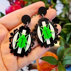 Brand New Pair Of Acrylic Halloween Earrings. On A Black And White Striped Victorian Frame There Is A Bright Green Beetle Insect. It Is So Much Fun With Its Creepy Crawler Look. Beetlejuice Inspired Jewelry, Beetle Earrings, Halloween Green, Green Beetle, Victorian Frame, Beetle Insect, Earrings Halloween, Goth Jewelry, Halloween Earrings