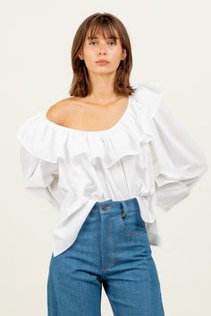 Our Cynthia Top is perfect for all your vintage styling dreams this summer. Inspired by the 80's, it features a darling ruffle neckline. Fabricated with a delicate 100% cotton lawn. We left an open tie back detail for something extra. Cotton Lawn Fabric, Garment Workers, Lawn Fabric, Cuff Detail, The 80's, Tapered Jeans, Fashion Labels, Tie Back, Sleeve Cotton