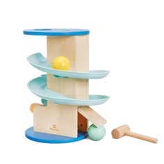 a wooden toy with blue shelves and yellow ball