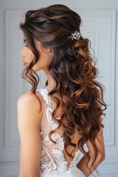 a woman with long hair wearing a wedding dress