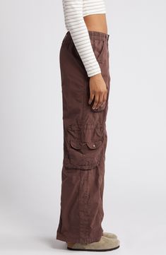 Tap into the retro look you missed the first time around in these all-cotton cargo pants featuring commodious bellows pockets to hold most everything you need. Exclusive retailer 31" inseam; 23 1/2" leg opening; 9 1/2" front rise; 13 1/2" back rise (size Medium) Back elastic waist 100% cotton Machine wash, line dry Made in Turkey Fall Relaxed Fit Parachute Pants With Cargo Pockets, Relaxed Fit Parachute Pants With Cargo Pockets For Fall, Baggy Full-length Cargo Pants With Patch Pockets, High Waist Cargo Pants With Cargo Pockets For Fall, Fall Relaxed Fit Parachute Pants With Multiple Pockets, Cargo Pants With Patch Pockets And Loose Fit, Utility Cargo Pants Full Length For Fall, 90s Style Cargo Pants With Pockets For Fall, Relaxed Fit Parachute Pants With Multiple Pockets For Fall