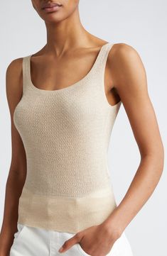 Shimmering threads bring understated glamour to this casual-staple sweater-knit tank with a scooped neck and ribbed hem. Scoop neck 89% viscose, 11% polyester Dry clean Made in Italy Designer Clothing Chic Knit Tank Top With Crew Neck, Chic Textured Knit Fitted Tank Top, Chic Fitted Textured Knit Tank Top, Chic Knit Crew Neck Tank Top, Chic Fitted Tank Top With Pointelle Knit, Elegant Sleeveless Textured Knit Top, Classic Knit Tank Top, Classic Knit Sleeveless Tank Top, Chic Everyday Knit Top With Scoop Neck