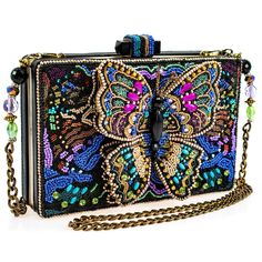 A true kaleidoscope of colors and textures take flight in this handbag. Detailed hand-beaded workmanship bring the artistic vision of this bag to life. A 3-dimensional beaded butterfly centerpiece ties the whole style together! Multicolor Beaded Bag For Evening, Embellished Multicolor Bags As Fashion Accessory, Embellished Multicolor Evening Bag, Multicolor Beaded Rectangular Evening Bag, Multicolor Beaded Evening Bag, Formal Multicolor Embellished Shoulder Bag, Evening Bags With Colorful Beads In Multicolor, Embellished Multicolor Rectangular Shoulder Bag, Gift Embellished Multicolor Shoulder Bag