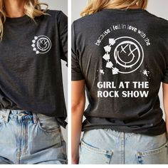 Don't we all want to be The Girl At The Rock Show?! Show your love for Blink 182 in this high quality tee - Bella & Canvas brand shirts are super soft cotton with a classic, comfortable fit, tear-away label, and sustainable manufacturing. Fits like a well loved favorite and washes well with no fading.  Front & Back designs. The back featuring lyrics "because I fell in love with the girl at the rock show" and a large smiley face logo, and the front with a small smiley face on the left side. Unise Y2k Graffiti Print Tops For Concert, Edgy Graphic Tops For Concert, Edgy Graphic Design Tops For Concert, Edgy Slogan T-shirt For Concert, Grunge Text Print Top For Music Festivals, Grunge Text Print Top For Concerts, Punk Style Tops With Text Print For Concert, Punk Tops For Concerts And Music Festivals, Punk Style Tops For Music Festivals And Concerts