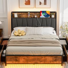 a bedroom with a bed, nightstands and pictures on the wall above it's headboard