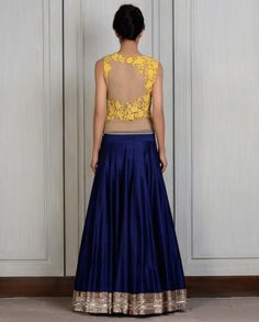 Corset of this lehenga is made in beige raw silk panelled with yellow resham and sequin embroidery on the front and sheer net back having side Zip Skirt: Blue raw silk skirt with hand-sewn sequins embroidered border and drawstring waist. Dupatta: Beige net dupatta with velvet golus. Can be customised in any color and with heavy dupatta Corset Lengha, Corset Lehenga, Heavy Dupatta, Curated Outfit, Blue Corset, Lehenga Choli Online, Embroidered Border, Sequin Embroidery, Net Dupatta