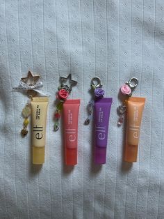 Elf lip balm keychains!  Handmade by me ❤️ Elf Lip Balm Keychain, Diy Cute Keychains, Lip Balm Charm Keychain, Christmas Keychains Diy, Lip Balm Keychain Diy, Lip Gloss Keychain Diy, Lip Balm Charm, Keychain Diy Ideas, Christmas Gift Ideas For Best Friend