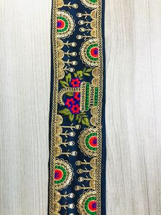 Embroidered Trimmings Ribbon Saree Border Fabric Trim Indian Sari Border Indian trim, beach bags lace, Embroidered Craft Ribbon, Decorating footwear lace, Indian Saree Trim. This beautiful Lace can be used for designing stylish blouses, shrugs, skirts, tunics, festive wear, wedding wear, and dresses. Hand sewn, home decoration, Arts and Crafts, Ottoman decoration, kids dress, Denim Jacket, etc. Measurements: approximately 3.35 inches wide This listing is sold by 1 yard. For Wholesale Purchase: P Celebration Art Silk Saree With Embroidered Border, Semi-stitched Embroidered Silk Fabric With Motifs, Festive Art Silk Dupatta With Border, Unstitched Embroidered Fabric With Border For Diwali, Semi-stitched Cutdana Embroidered Fabric For Celebration, Multicolor Semi-stitched Dupatta With Border, Green Art Silk Fabric With Embroidered Border, Unstitched Gold Embroidered Choli, Diwali Green Embroidered Border Fabric