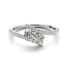 a white gold engagement ring with two diamonds