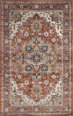 an orange and blue rug with many different designs on it's sides, including the center