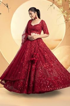 A vibrant red lehenga featuring tonal embroidery with intricate beadwork, sequins, and cutdana. This ensemble exudes elegance and sophistication. WASH CARE INSTRUCTIONS - Please Dry clean only when it is applicable! Ready to Ship! Formal Anarkali Lehenga Embellished, Anarkali Style Embellished Lehenga For Formal Occasions, Formal Embellished Anarkali Lehenga, Red Anarkali Dress With Sequins, Elegant Red Lehenga With Sequins, Red Sequined Sharara For Wedding, Red Embroidered Party Wear Dresses, Red Sequined Wedding Set, Red Wedding Sets With Sequins