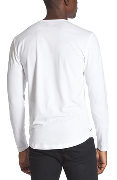 Made from a soft cotton blend, a versatile long-sleeve T-shirt enhanced with a curved hem is an instant closet favorite that looks great alone or layered. Crewneck Long sleeves 62% polyester, 33% cotton, 5% spandex Machine wash, tumble dry Imported Long Sleeve Cotton T-shirt For Loungewear, Cotton Tops With Shirttail Hem For Fall, Stretch Long Sleeve T-shirt For Layering, Stretch Long Sleeve T-shirt For Everyday, Casual Long Sleeve Top With Shirttail Hem, Everyday Stretch Long Sleeve T-shirt, Cotton Stretch Long Sleeve Top For Everyday, Everyday Cotton Stretch Long Sleeve Top, Everyday Stretch Cotton Long Sleeve Top