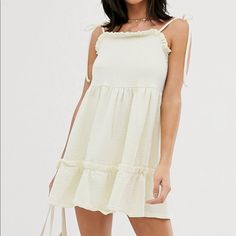 This Dress Is Adorable! Such An Easy Wear With Sneakers. Never Worn! Size 4. Fits Like A Small. Enjoy Cute Cotton Mini Dress For Brunch, Off White Sleeveless Mini Dress With Ruffles, Off White Sleeveless Ruffled Mini Dress, Cute Cream Mini Dress, Cute Sleeveless Cream Mini Dress, Daytime Cotton Mini Dress, Off White Sundress Mini Dress For Day Out, Cotton Mini Dress For Daytime, Cute Mini Sundress For Daywear