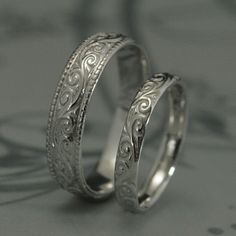 This is a wonderfully lovely set for a wonderfully lovely couple! It features a vintage style design with a modern twist to it. Cast in solid 14K gold, it features a swirling design around the entire outer surface. The wider band measures 5.5mm wide by 1.5mm thick. It features a lovely milgrain edge. The thinner band measures 3.5mm wide by 1.5mm thick and features the matching design without the edge. These are quality solid gold rings to last you a lifetime and then some! Your rings can be cast Yellow Gold Wedding Ring With Elegant Design, White Gold Wedding Jewelry With Classic Design, Yellow Gold Bridal Sets For Wedding With Elegant Design, Classic White Gold Wedding Jewelry, Classic Design White Gold Wedding Jewelry, Elegant Yellow Gold Bridal Sets For Wedding, Classic 14k Gold Wedding Jewelry, Elegant White Gold Couple Wedding Rings, Elegant Formal Engraved Couple Rings