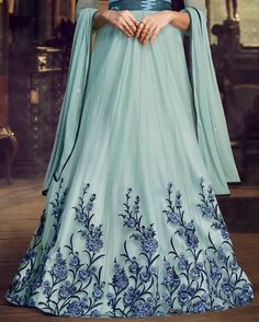 Sky Blue Designer Embroidered Satin Anarkali Gown-Saira's Boutique Blue Floor-length Gown For Eid, Fitted Anarkali Gown With Intricate Embroidery, Fitted Floor-length Anarkali Set With Intricate Embroidery, Intricately Embroidered Fitted Gown For Eid, Fitted Embroidered Gown For Eid, Embroidered Semi-stitched Maxi Length Lehenga, Light Blue Anarkali Dress With Intricate Embroidery, Fitted Georgette Gown With Intricate Embroidery, Fitted Floor-length Anarkali Embroidered Fabric