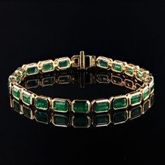 DETAILS: - Approx 12 carats of natural emeralds set in 14k yellow gold -6.5 inches Luxury Emerald Cut Gemstone With 17 Jewels, Classic Emerald Cut Gemstone Bracelets, Luxury Hand-set Emerald Necklace, Luxury Yellow Gold Emerald Necklace With Prong Setting, Luxury Emerald Gemstones In Yellow Gold, Luxury Yellow Gold Emerald Gemstones, Elegant Green Gemstones In 14k Gold, Classic Emerald-cut Emerald Bracelet, Formal Emerald Gemstone Bracelets