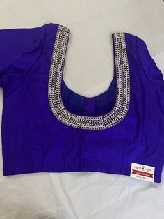 Description  1- fabric - Silk 2-color- purple  3- sleeve length -10" 4-Size-36" can be open till 40" 5- nake front deep 7/12" and back 10" 6- princes cut front open blouse Please contact us if you have any questions regarding the product. Purple Silk Blouse Piece With Resham Embroidery, Purple Embroidered Silk Blouse Piece, Purple Zari Work Blouse Piece For Formal Wear, Purple Zari Work Blouse Piece For Formal Occasions, Elegant Purple Blouse With Zari Work, Elegant Purple Blouse With Resham Embroidery, Formal Purple Zari Work Blouse Piece, Formal Purple Blouse Piece With Zari Work, Traditional Purple Formal Blouse Piece