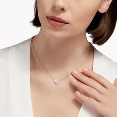 A sparkling celebration of love, our Icon heart shape diamond pendant in white gold is designed to make a delicately scintillating statement upon the décolletage. Framing the centre stone is a gleaming halo of pavé diamonds that extends to the gallery beneath to ensure a scintillating silhouette from every angle. Named after the famous Icon diamond – a 90.97 carat D Flawless round brilliant diamond that was cut and polished by Graff in 2000 – the Icon collection celebrates the incomparable beaut Diamond Shaped Engagement Ring, Heart Shaped Diamond Pendant, Diamond Drop Pendant, Graff Diamonds, Round Diamond Pendant, Rare Diamond, Necklaces Diamond, The Bling Ring, Necklace Outfit