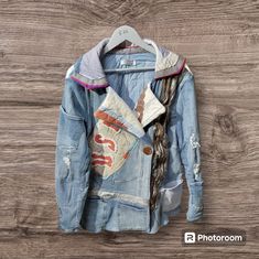 Jean Jacket App Cycled From Many Jeans And Children's Bed Spread.What A Treasure Denim Blazer With Long Sleeves For Winter, Winter Denim Blazer With Long Sleeves, Long Sleeve Denim Blazer For Winter, Winter Long Sleeve Denim Blazer, Casual Patchwork Blazer For Winter, Bohemian Blue Hooded Outerwear, Blue Bohemian Hooded Outerwear, Blue Bohemian Outerwear With Pockets, Casual Blue Reworked Outerwear