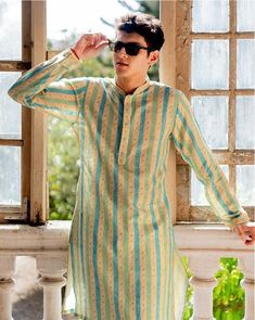 *PRODUCT DETAILS:- This light, Cream stripe print kurta set showcases the beauty of the stripe color green and rama green print style throughout, offering fresh and lively vibes. It features a bandhgala neckline, with simple flat buttons adding a touch of sophistication. The set includes matching payjamas. Style with patterned jutis and a metallic watch. *THREAD TALE:- This Kurta Set has been made by our karigars (craftsmen) with a lot of love and eye for detail. *FEATURES:- Color:  Cream stipe Yellow Casual Festive Sets, Yellow Casual Sets For Festive Season, Casual Yellow Festive Sets, Festive Yellow Casual Sets, Green Cotton Kurta For Summer, Green Cotton Kurta For Spring, Summer Green Cotton Kurta, Green Casual Summer Kurta, Casual Green Kurta For Spring