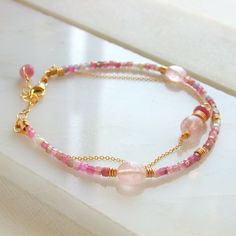 A two strand bracelet with pink tourmaline and polished ovals of morganite. Shown in 14k gold fill, also available in sterling silver and rose gold fill.  I use only the finest quality materials to make my pieces. Each stone is carefully selected and I never use plated materials. All chains, wires and findings are sterling silver or 14k gold fill. I guarantee all of my work, including materials as well as the craftsmanship. I will be more than happy to replace, repair or refund if you are not ha Minimalist Bracelets, Morganite Bracelet, Pink Gemstone Bracelet, Wedding Bracelets, Bracelet Simple, Wedding Jewelry Bracelets, Minimalist Bracelet, Pink Gemstones, Nov 1